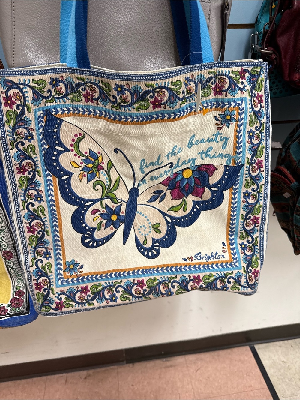 Brighton Canvas Tote with Blue Butterfly and Multicolor Floral Accents